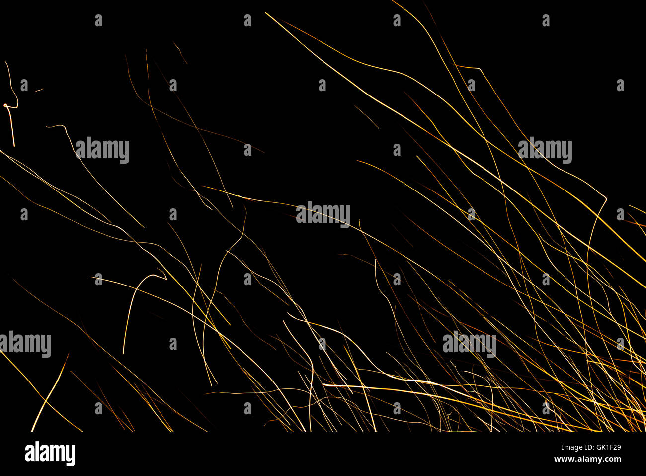Dancing flames and sparks isolated on black Stock Photo - Alamy