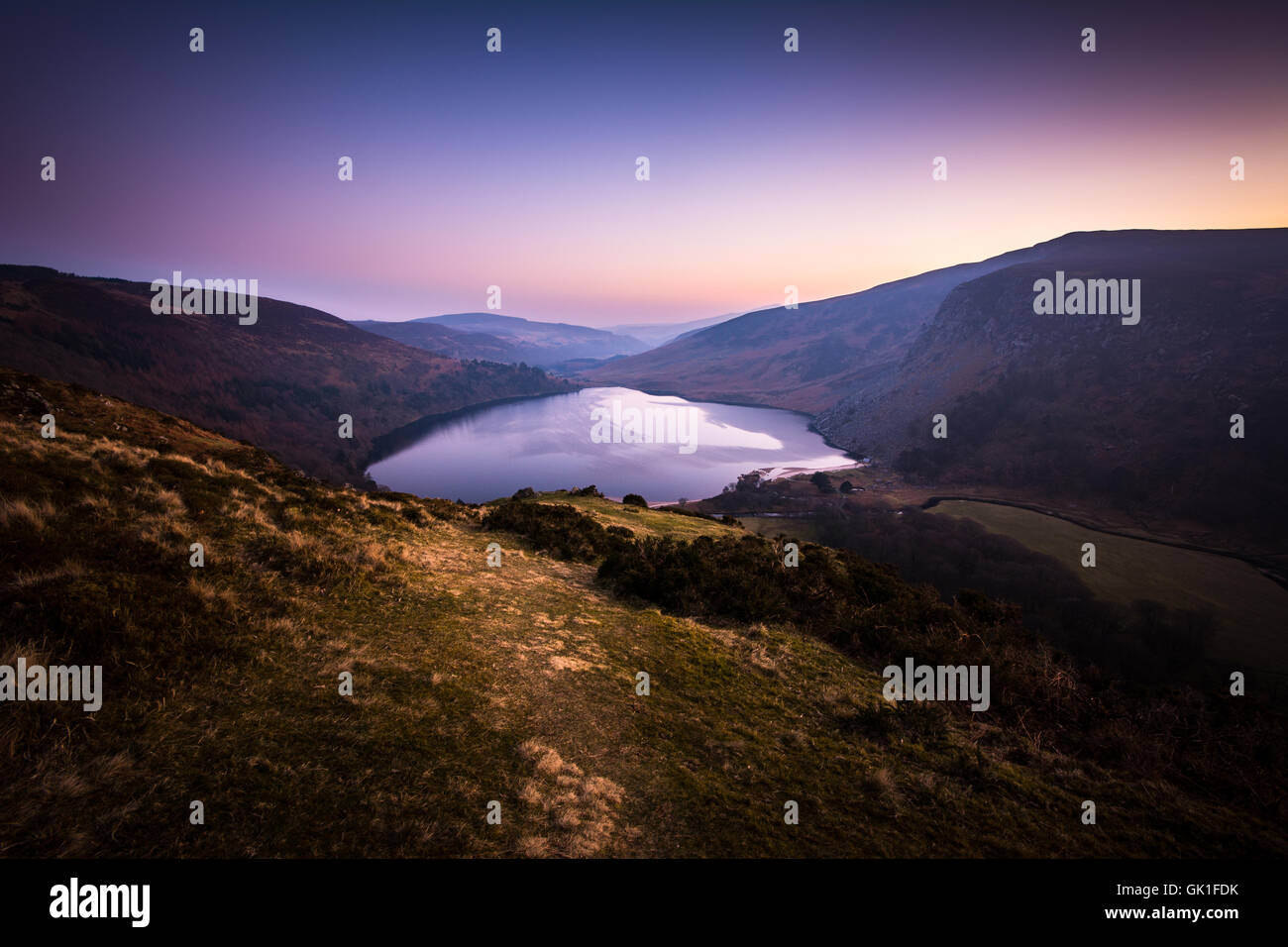 Landscape of dusk over the Guinness lake, Lough Tay, in County Wicklow, Ireland Stock Photo