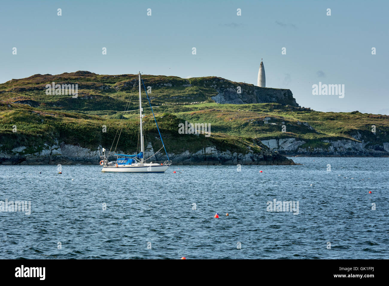 Yacht anchored off Baltimore Head in West Cork along the Wild Atlantic Way on the West Coast of Ireland Stock Photo