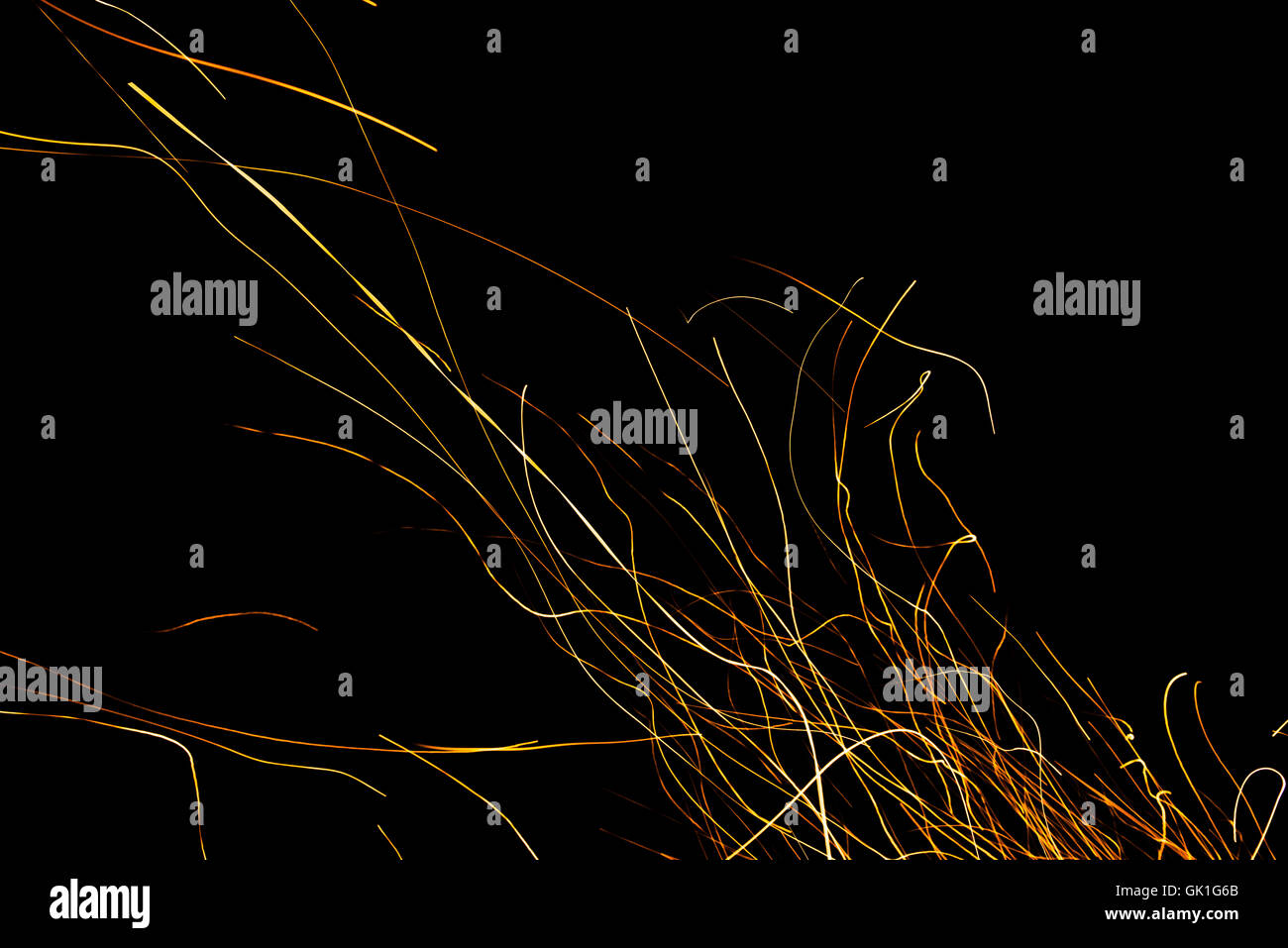 Dancing flames and sparks isolated on black Stock Photo - Alamy