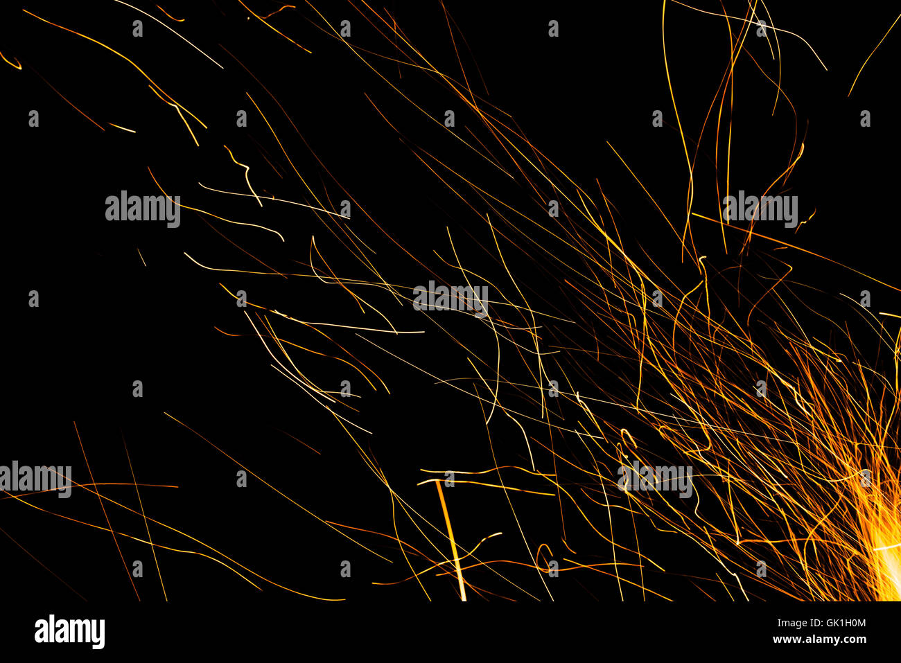 Dancing flames and sparks isolated on black Stock Photo - Alamy