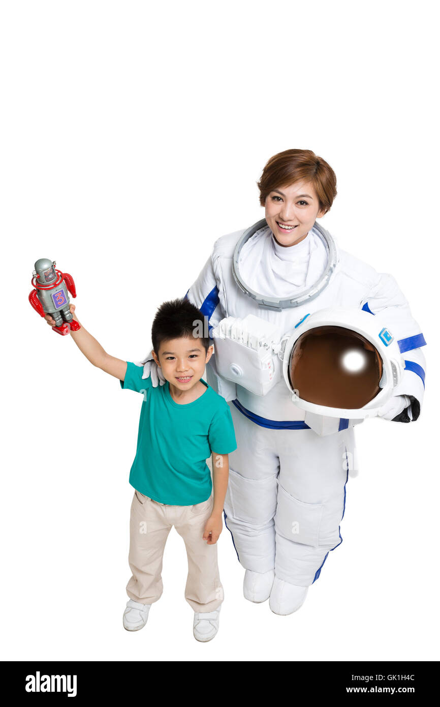 Studio shot astronauts and the little boy Stock Photo