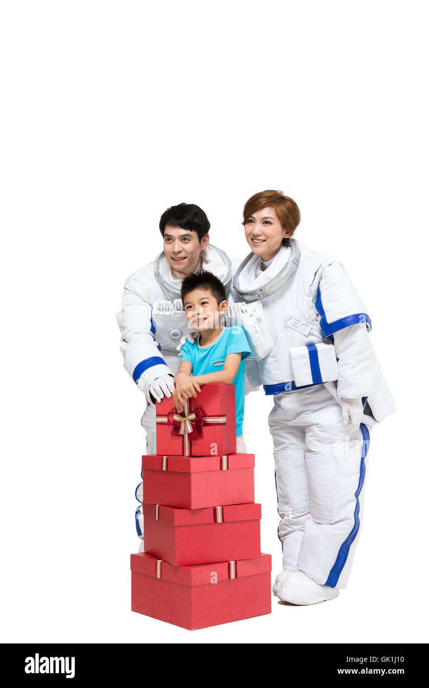 Studio shot astronauts and the little boy Stock Photo