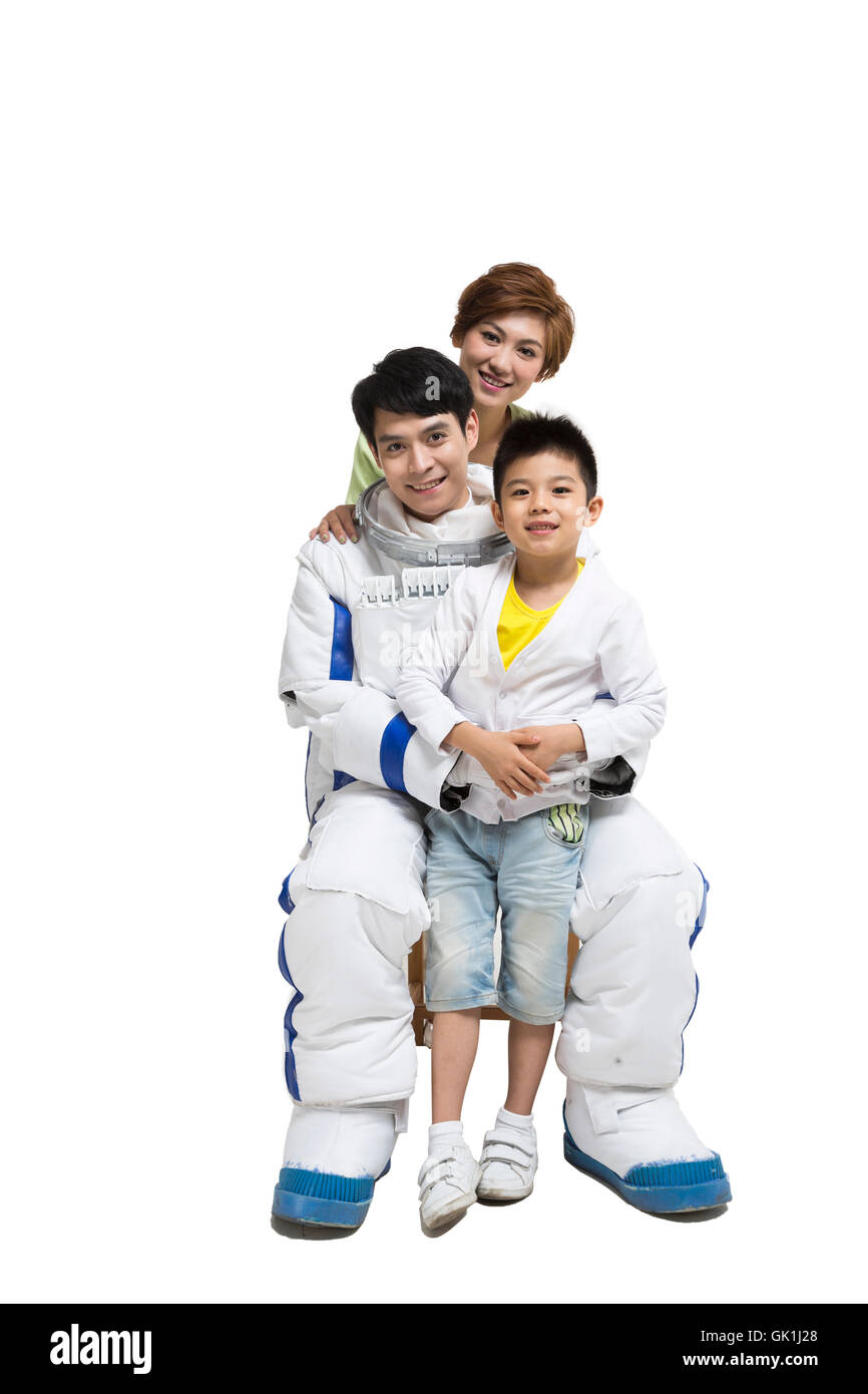Studio shot astronauts and the little boy Stock Photo