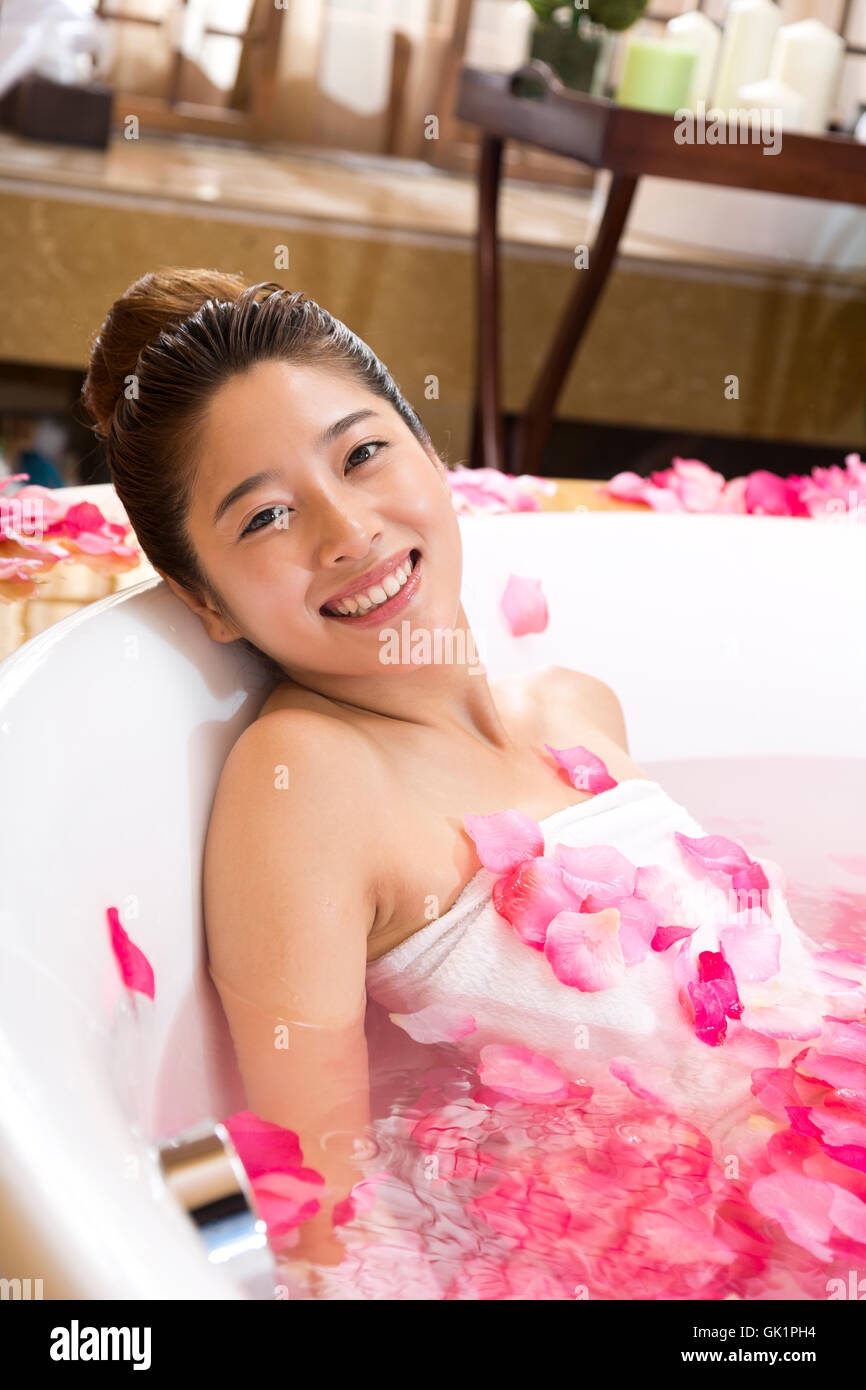 A young woman bathing Stock Photo - Alamy