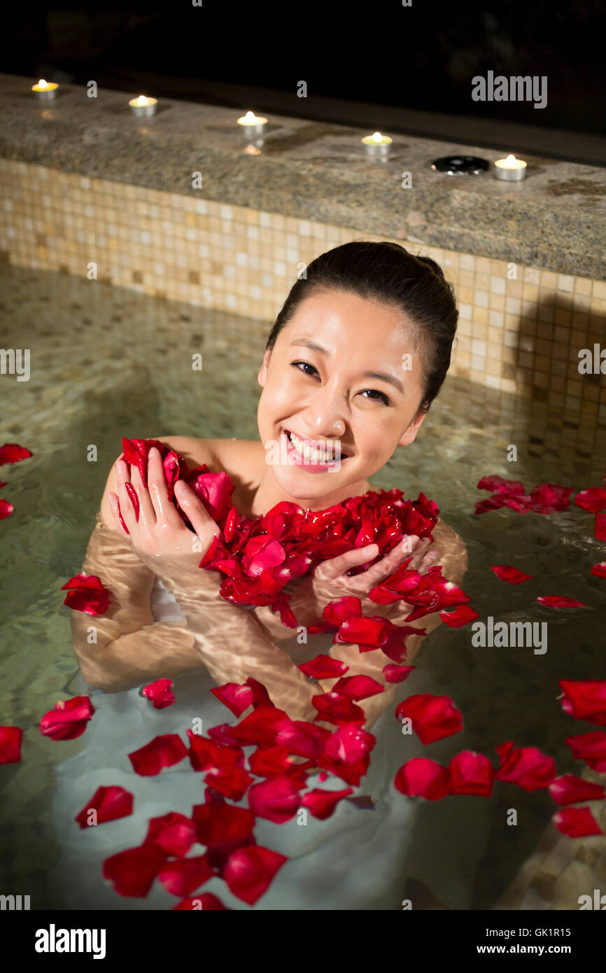 Young woman bathing Stock Photo - Alamy