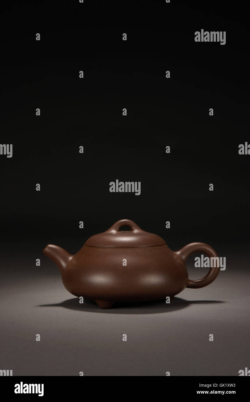 Stone scoop Teapot Stock Photo Alamy