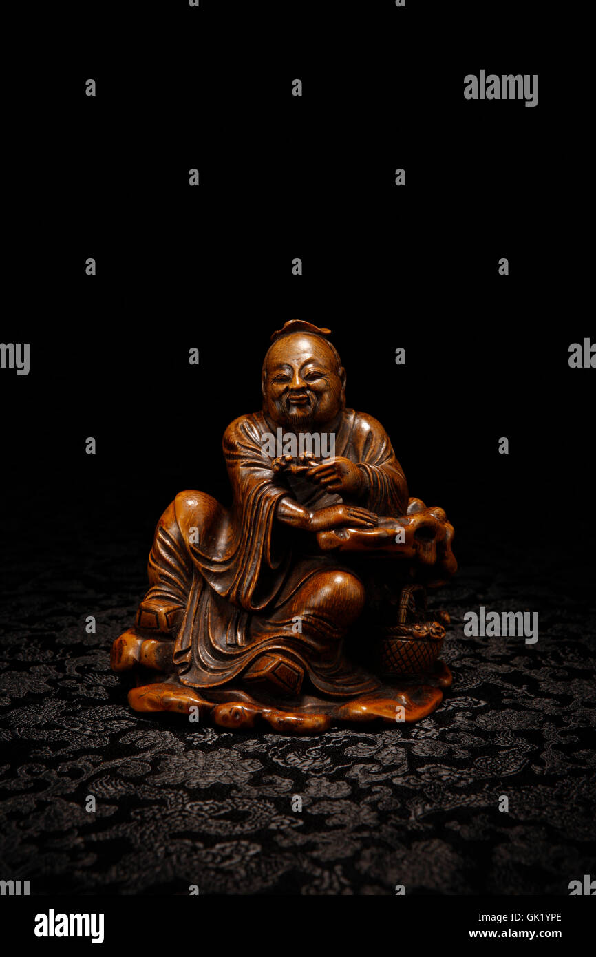 Woodcarving figure ornaments Stock Photo Alamy