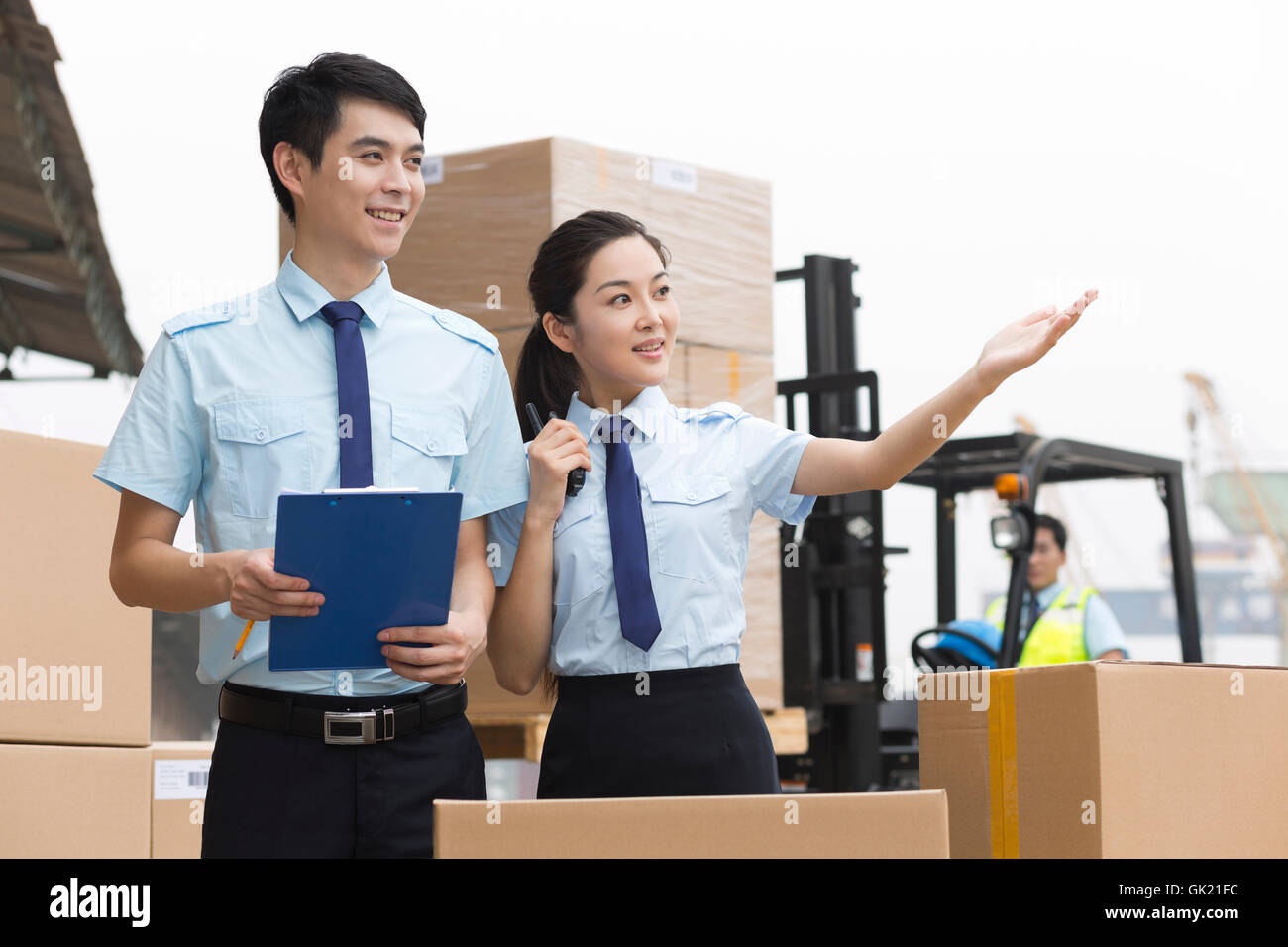 Logistics warehouse manager in communication Stock Photo