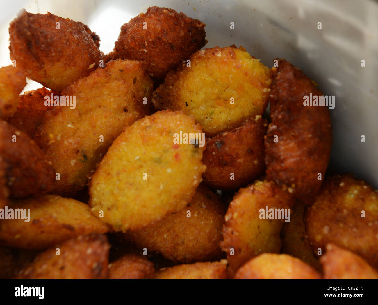 Freshly deep fried corn fritters (Frituras de Maiz). Stock Photo