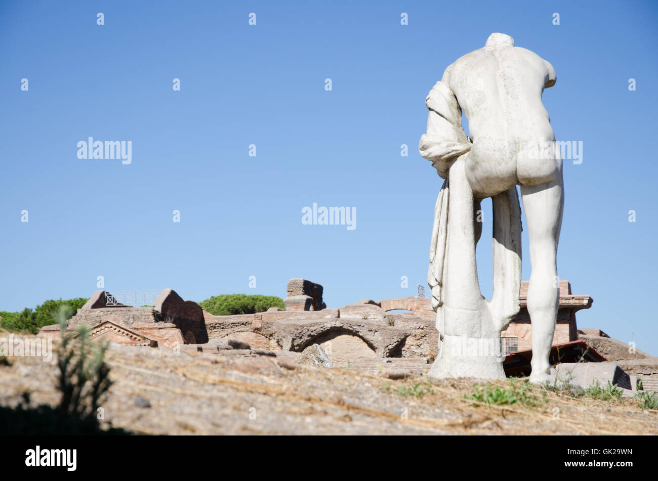Ruins of Ostia antica, Italy. Republican sacred area, statue of Hercules Stock Photo