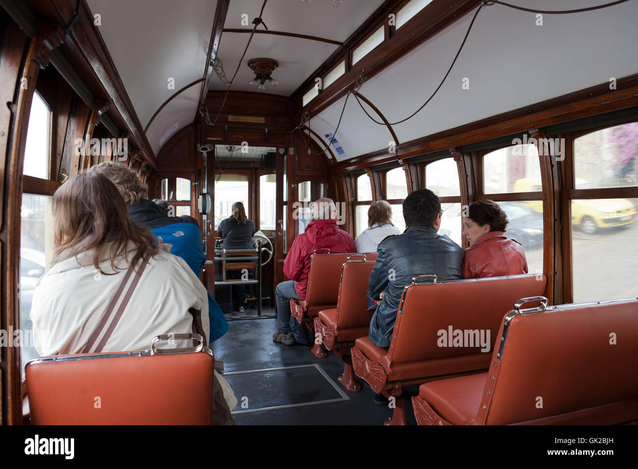Historical vintage tram interior in Porto, Portugal, urban transport from city centre to Foz do Douro, tourist attraction Stock Photo