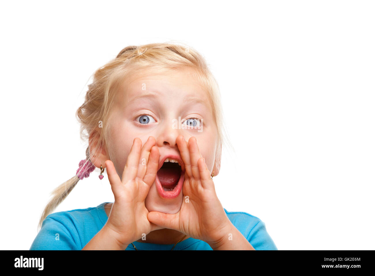 young blond girl screams Stock Photo