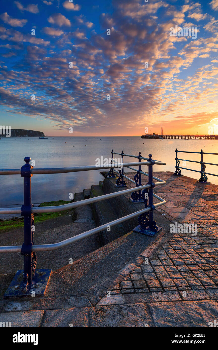 Sunrise captured from the promenade at Swanage in Dorset. Stock Photo