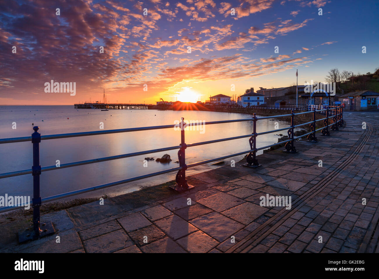 Sunrise captured from the promenade at Swanage in Dorset. Stock Photo