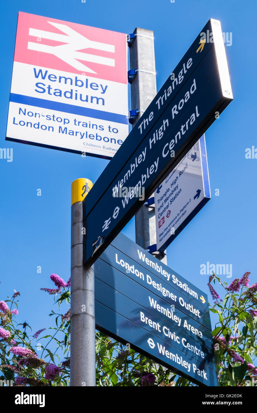 Wembley Stadium station signposts, Wembley, Borough of Brent, London, England, U.K. Stock Photo