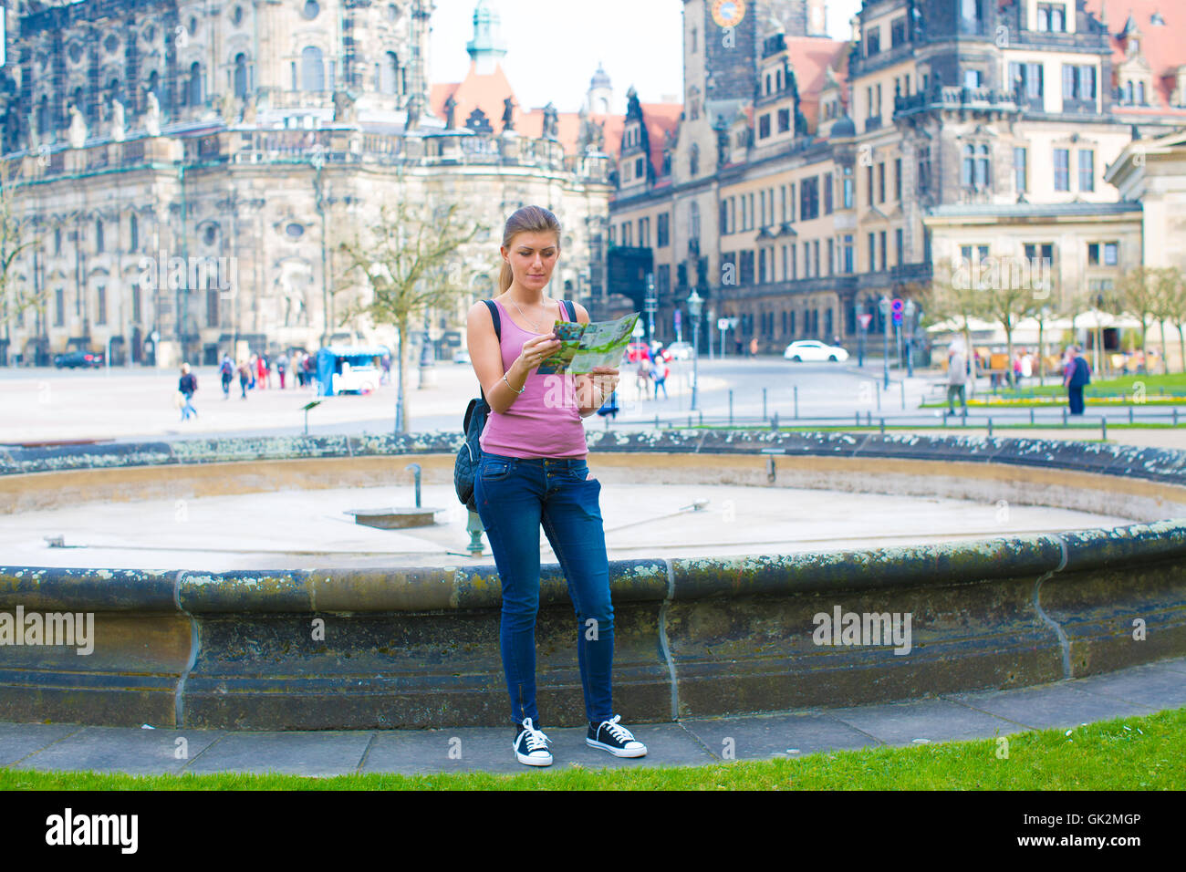 Young woman read travel guid in Dresden. Germany Stock Photo