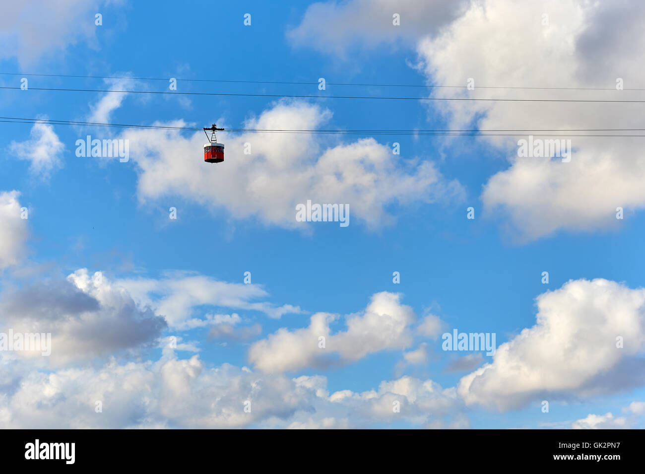 Cable car against blue cloudy sky Stock Photo - Alamy