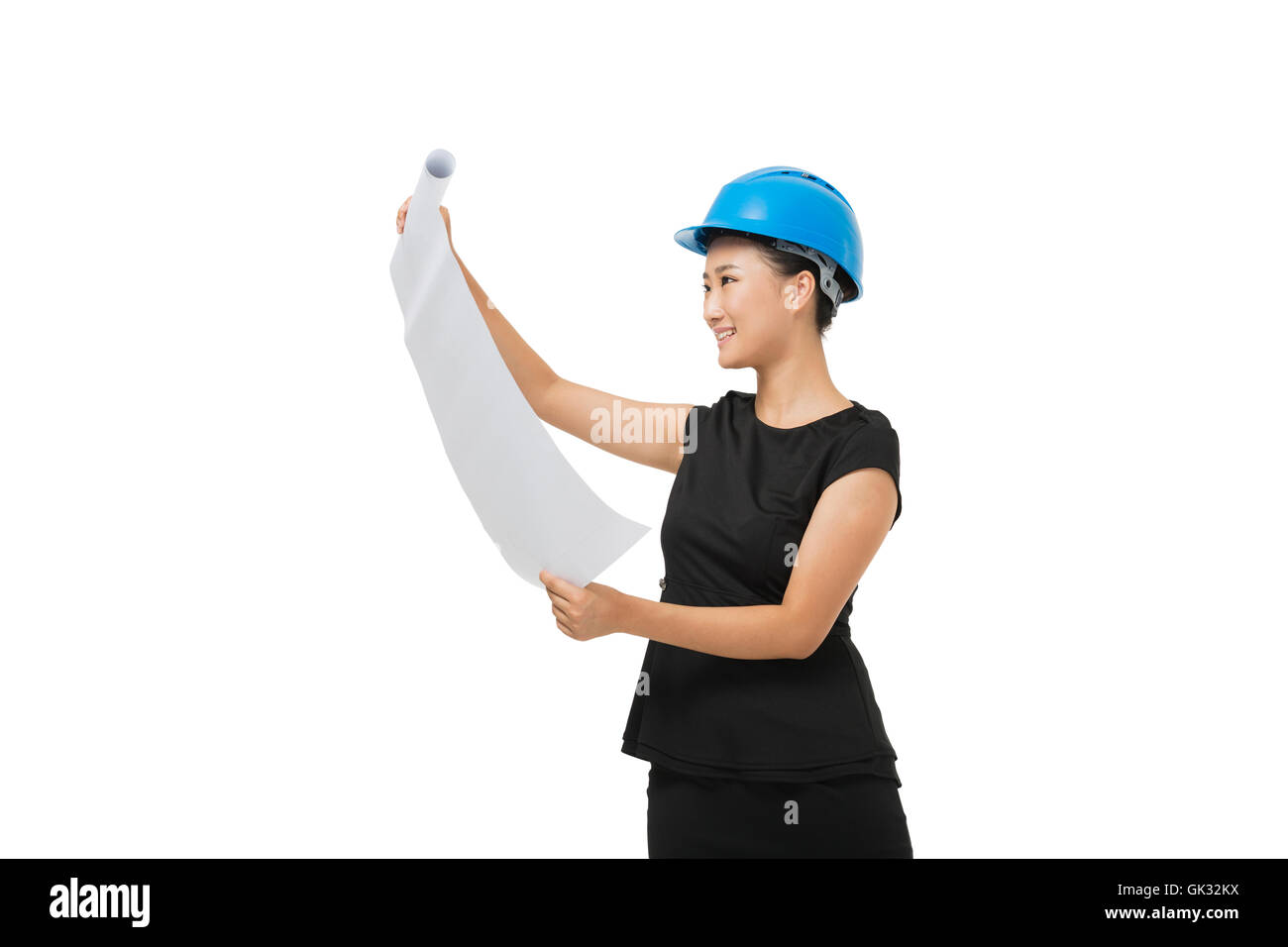 Female architect holding a blueprint Stock Photo - Alamy