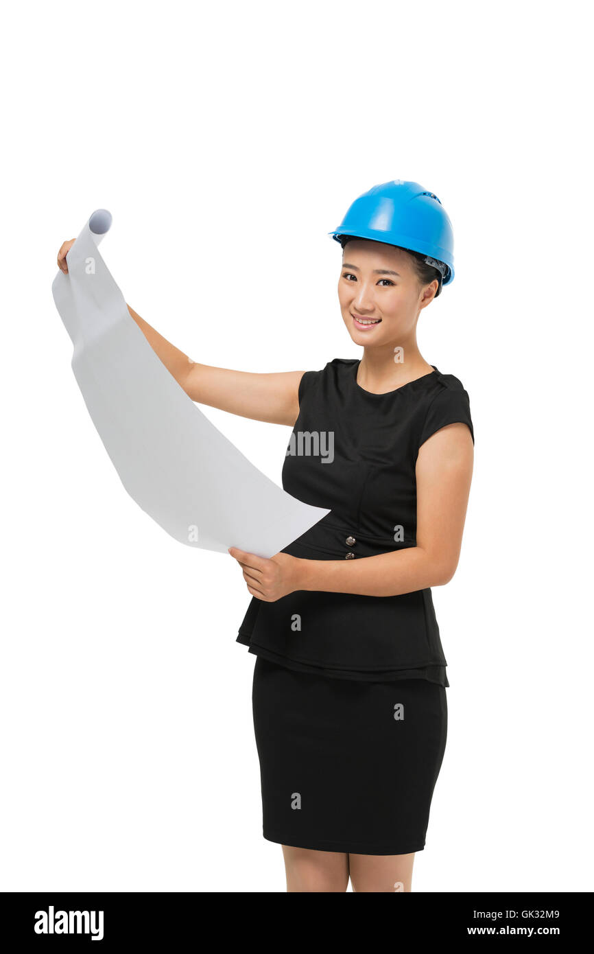 Female architect holding a blueprint Stock Photo - Alamy
