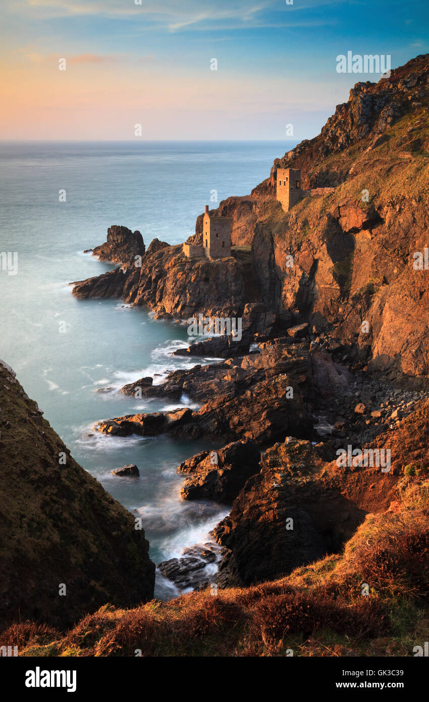 The Crowns engine houses at Botallack in Cornwall, bathed in late evening light. Stock Photo