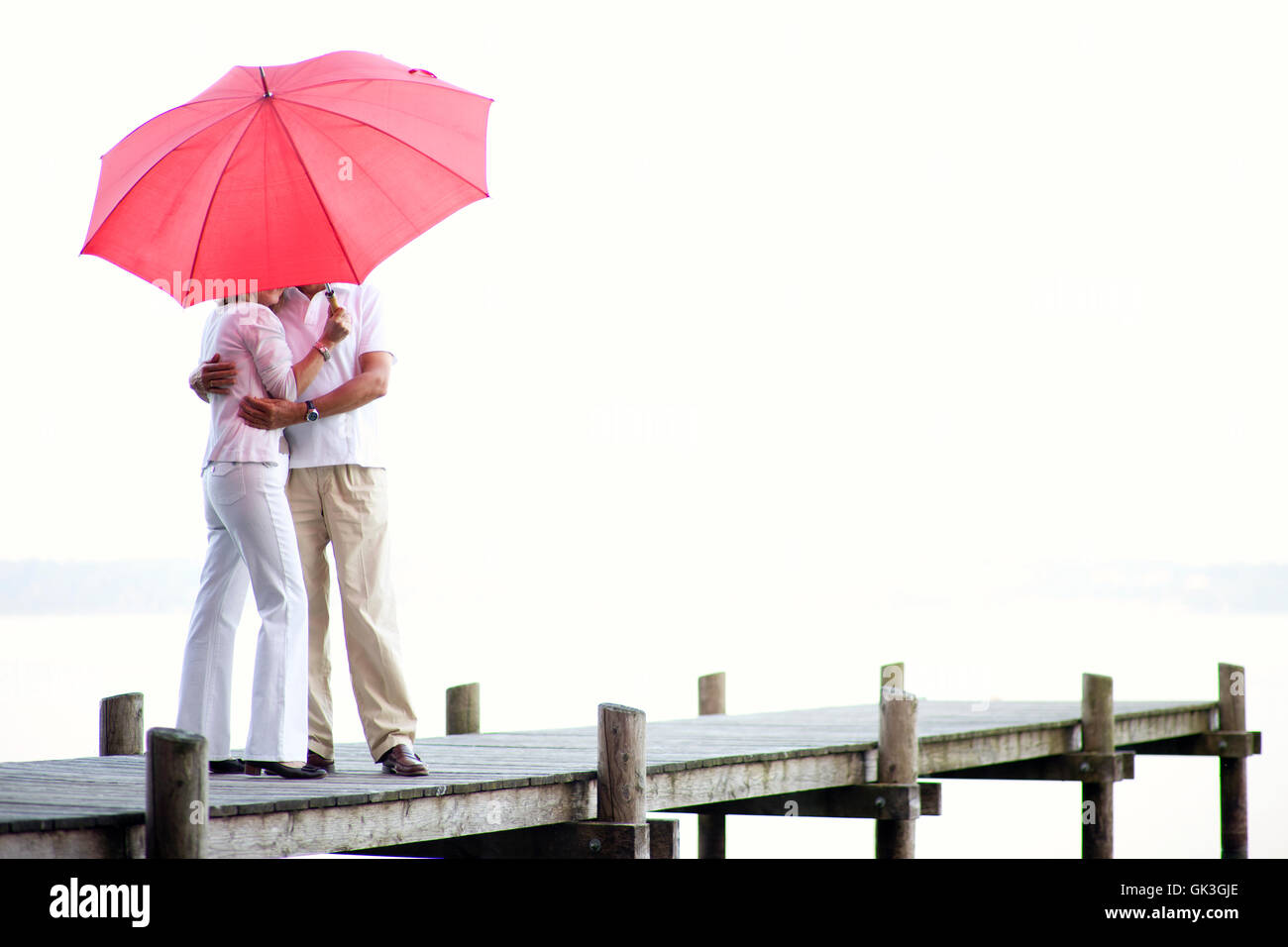 woman umbrella fresh water Stock Photo