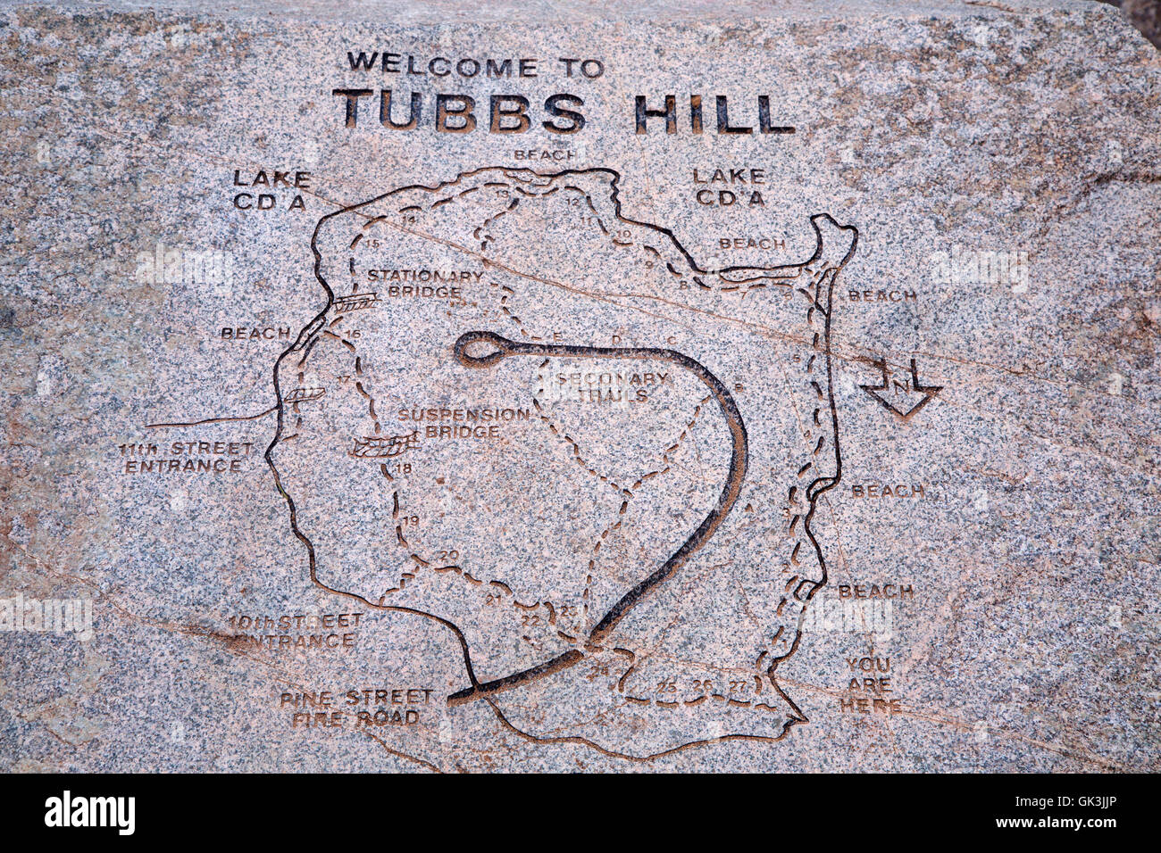 Carved trailhead map, Tubbs Hill Natural Area, Coeur D'Alene, Idaho Stock Photo
