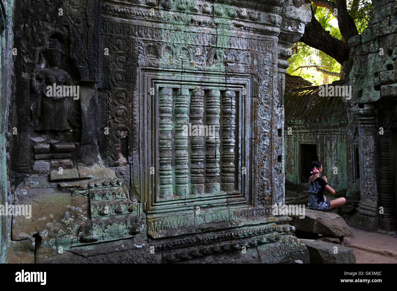 20 Jan 2012, Angkor, Cambodia --- Meditating, Ta Prohm, Angkor temples, Siem Reap, Cambodia --- Image by © Jeremy Horner Stock Photo