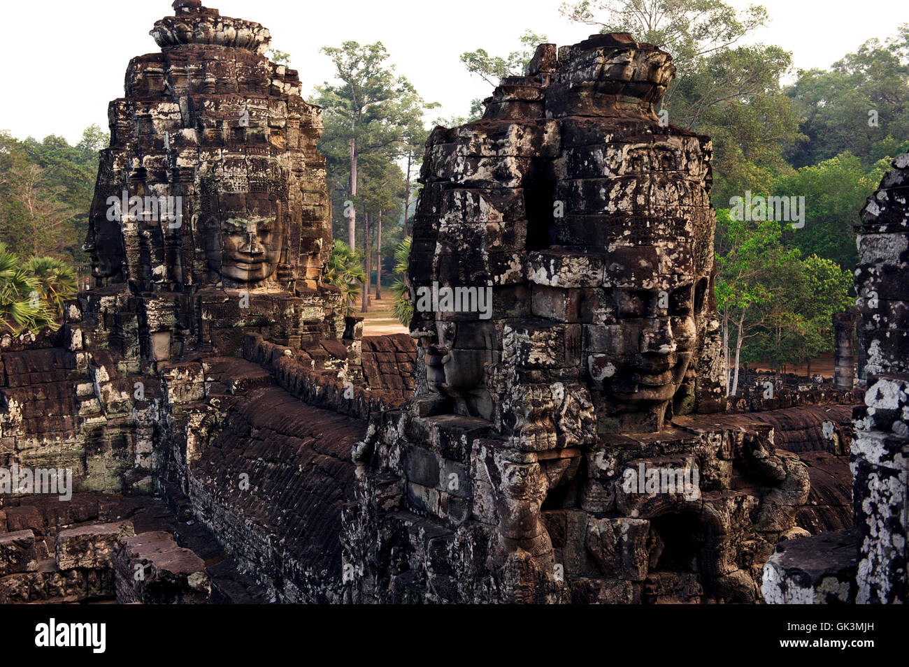 17 Jan 2012, Angkor, Cambodia --- The multiple gigantic carved stone heads of King Jayavarman VII characterise the most mystical Stock Photo