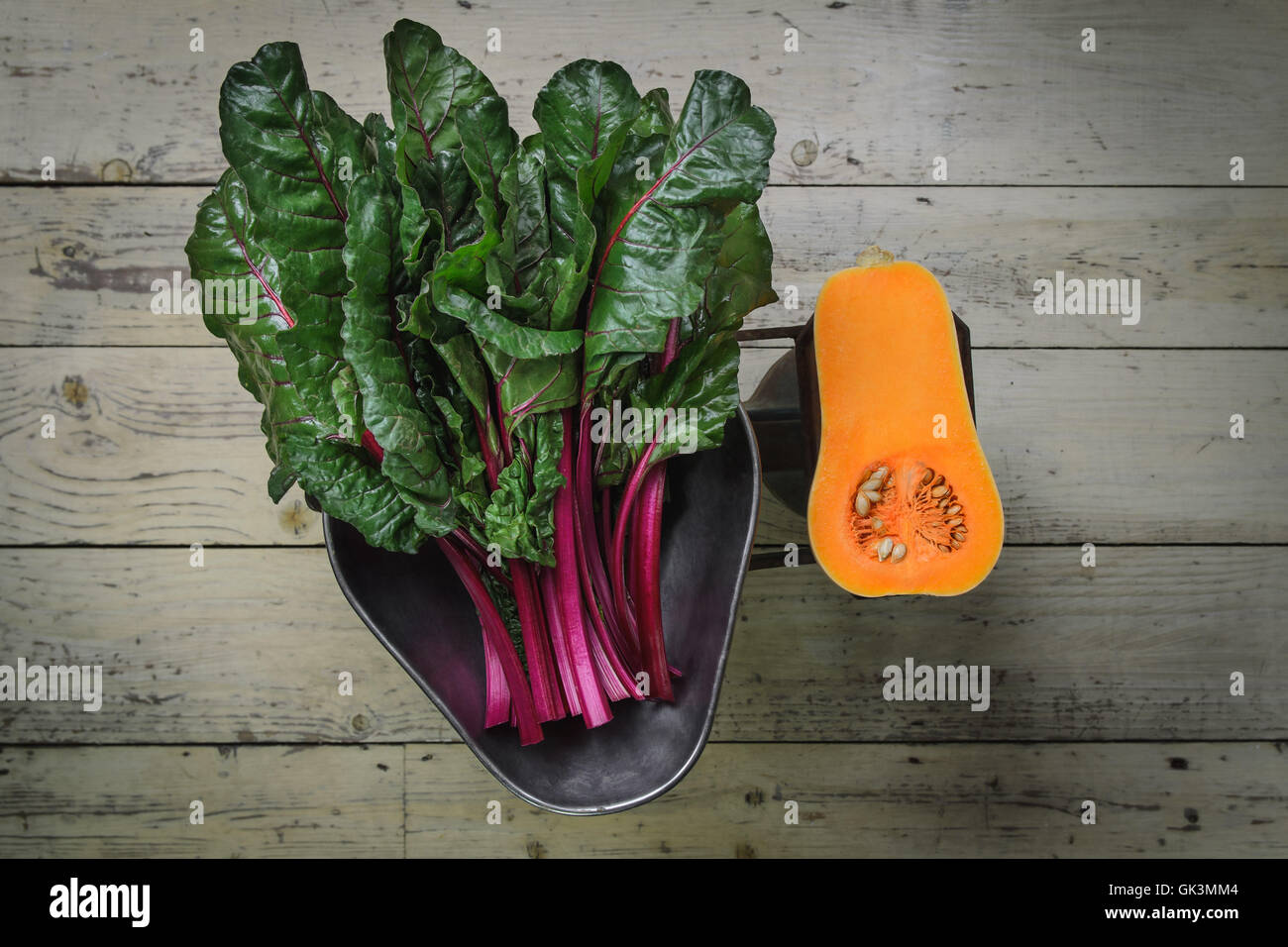 Vegetables on old scale Stock Photo