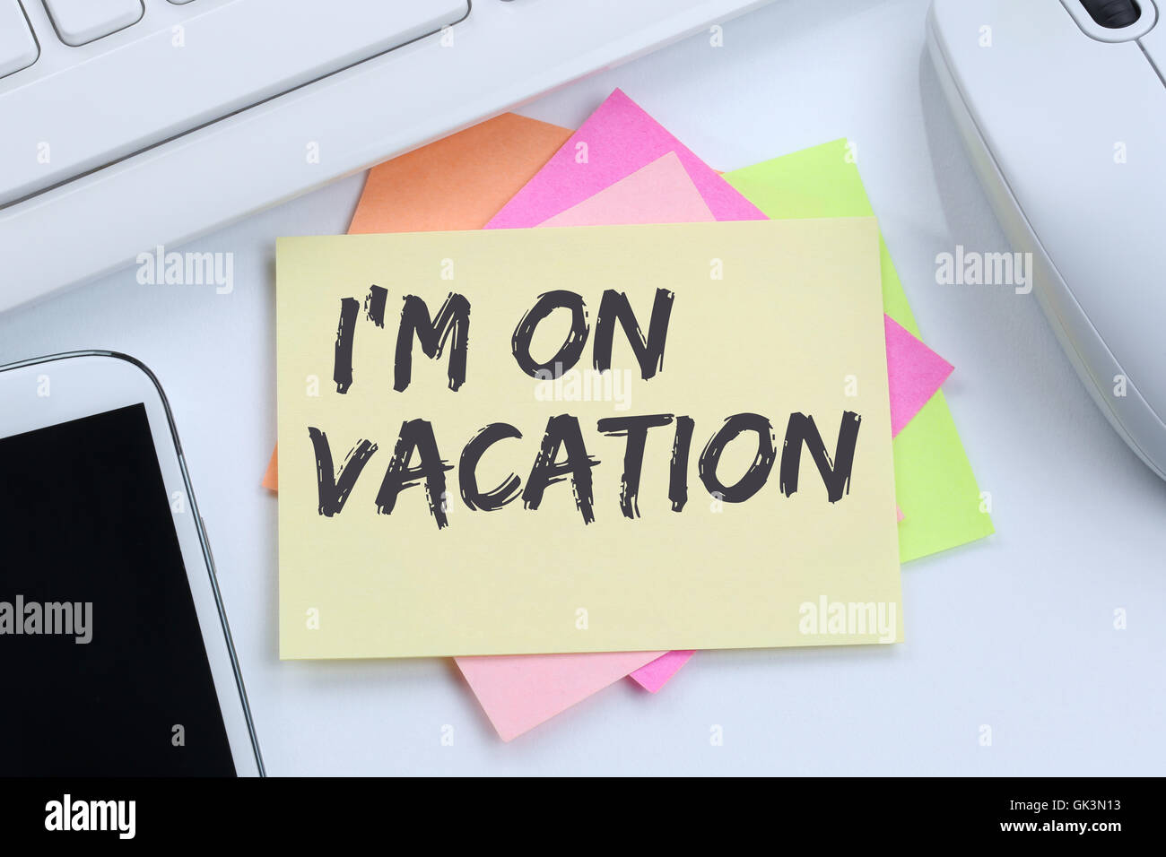 I'm on vacation travel traveling holiday holidays relax relaxed break free time desk computer keyboard Stock Photo