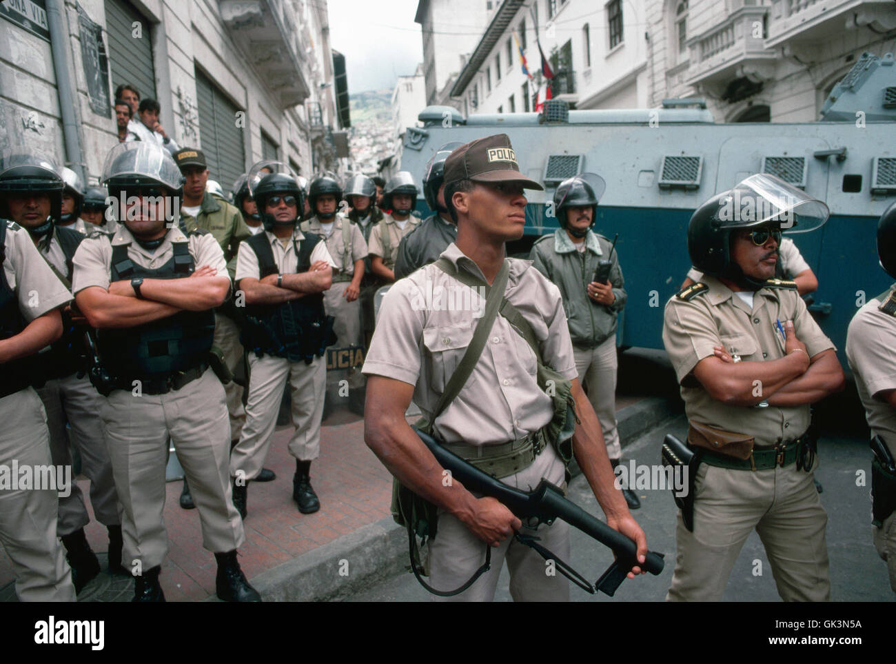 ca. 19801995, Quito, Ecuador Armed riot police wait in formation
