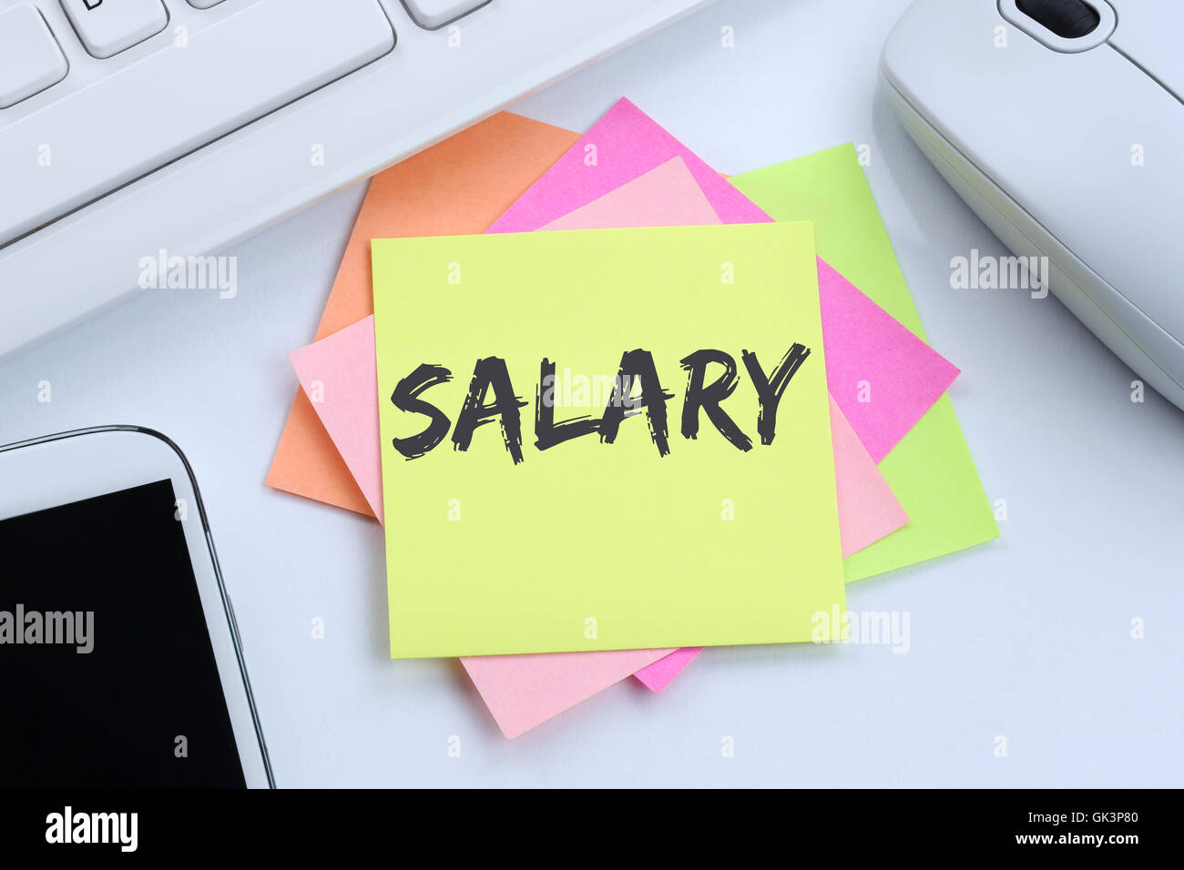 Salary increase negotiation wages money finance business concept desk computer keyboard Stock Photo
