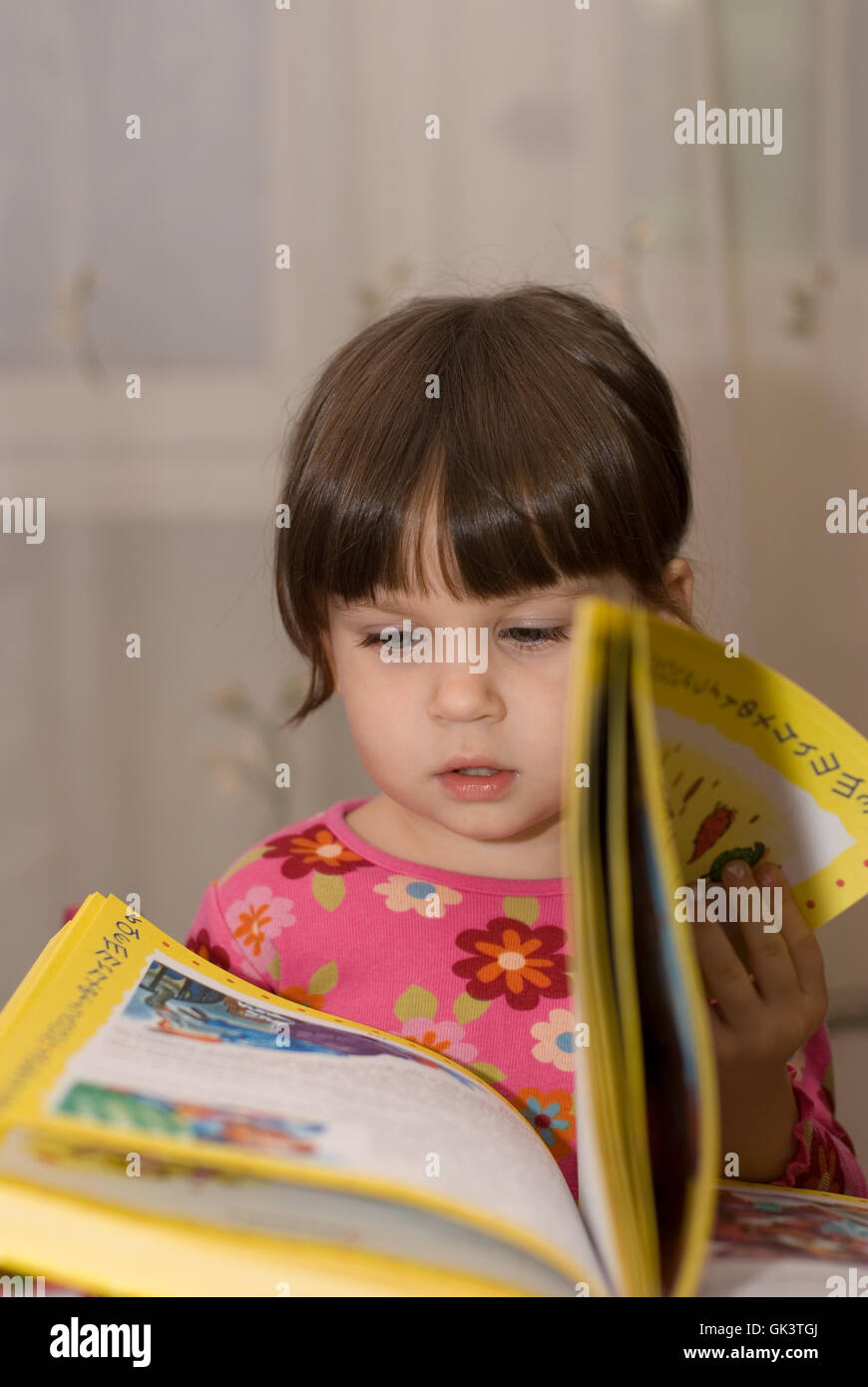 child reading the book Stock Photo Alamy