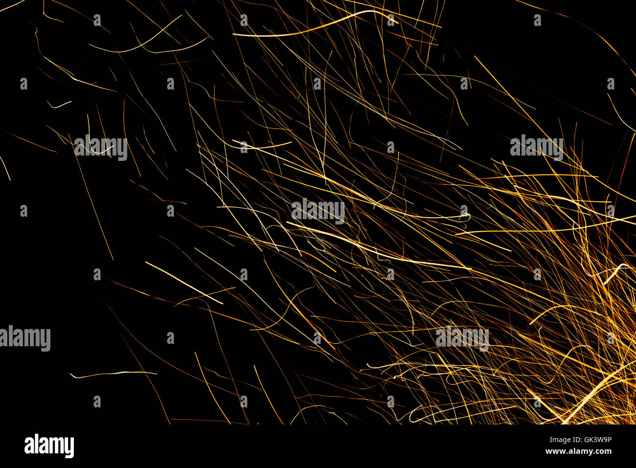 Dancing flames and sparks isolated on black Stock Photo - Alamy