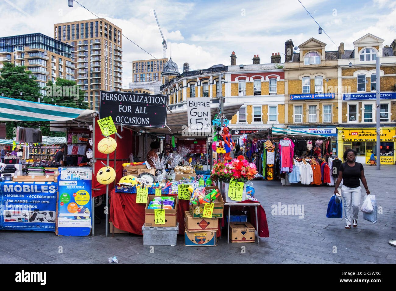 Market stalls and shops in Beresford Square, Woolwich, London Stock