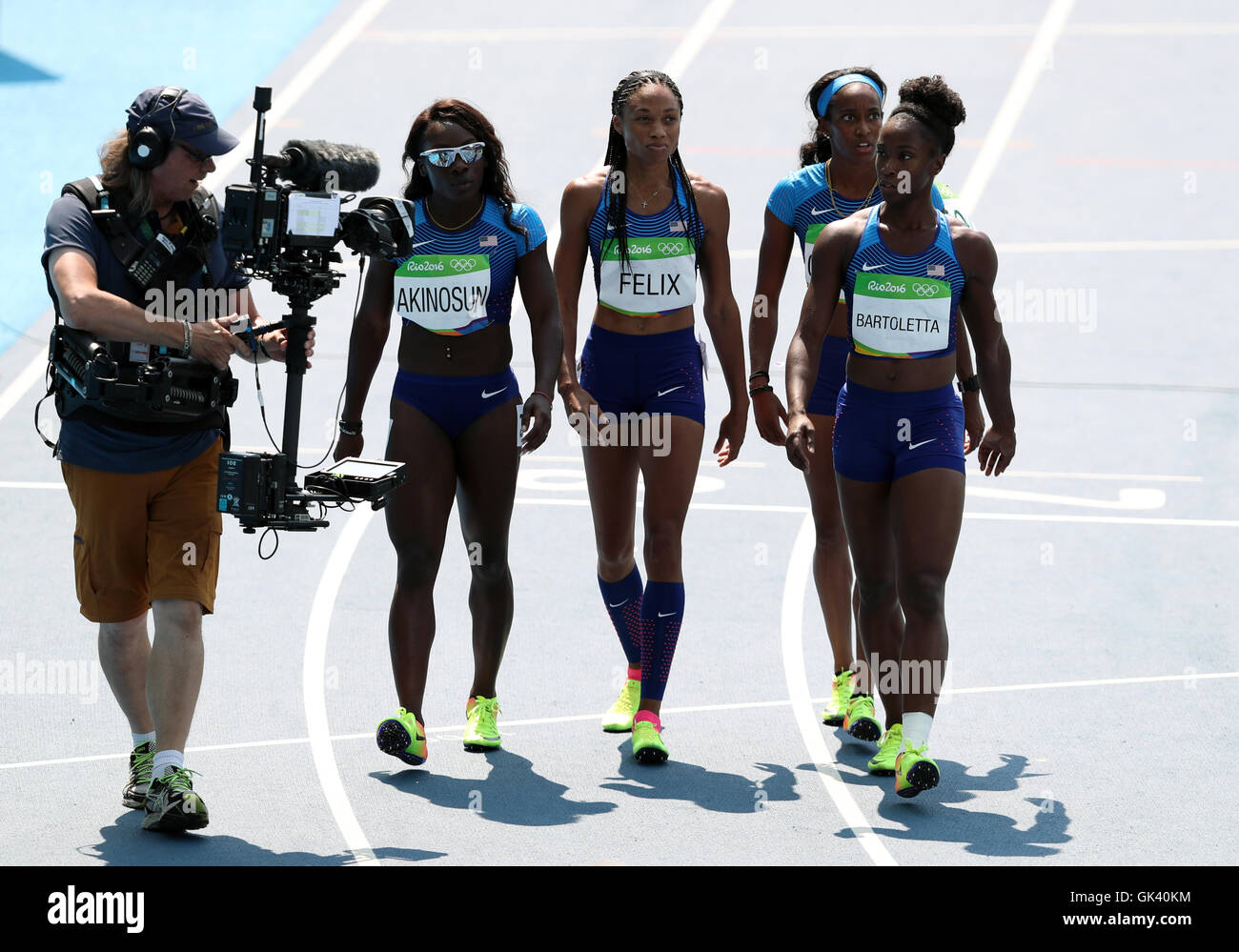 USA's (right-left) Tianna Bartoletta, English Gardner, Allyson Felix and Morolake Akinosun fail to qualify for the Women's 4x100m relay final at the Olympic Stadium on the thirteenth day of the Rio Olympics Games, Brazil. Stock Photo