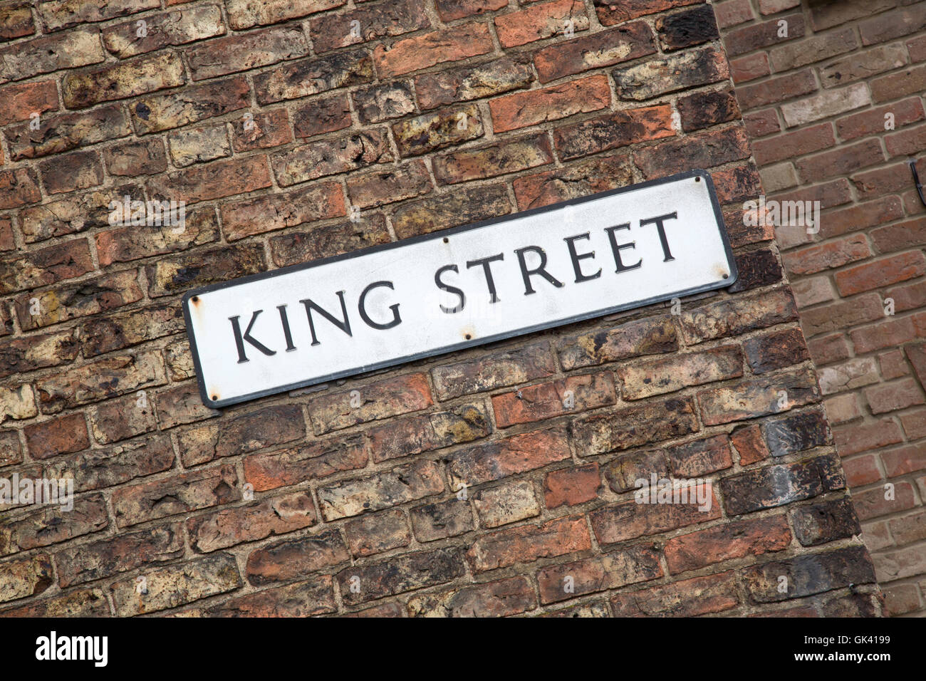 King Street Road Sign on Brick Wall Stock Photo - Alamy