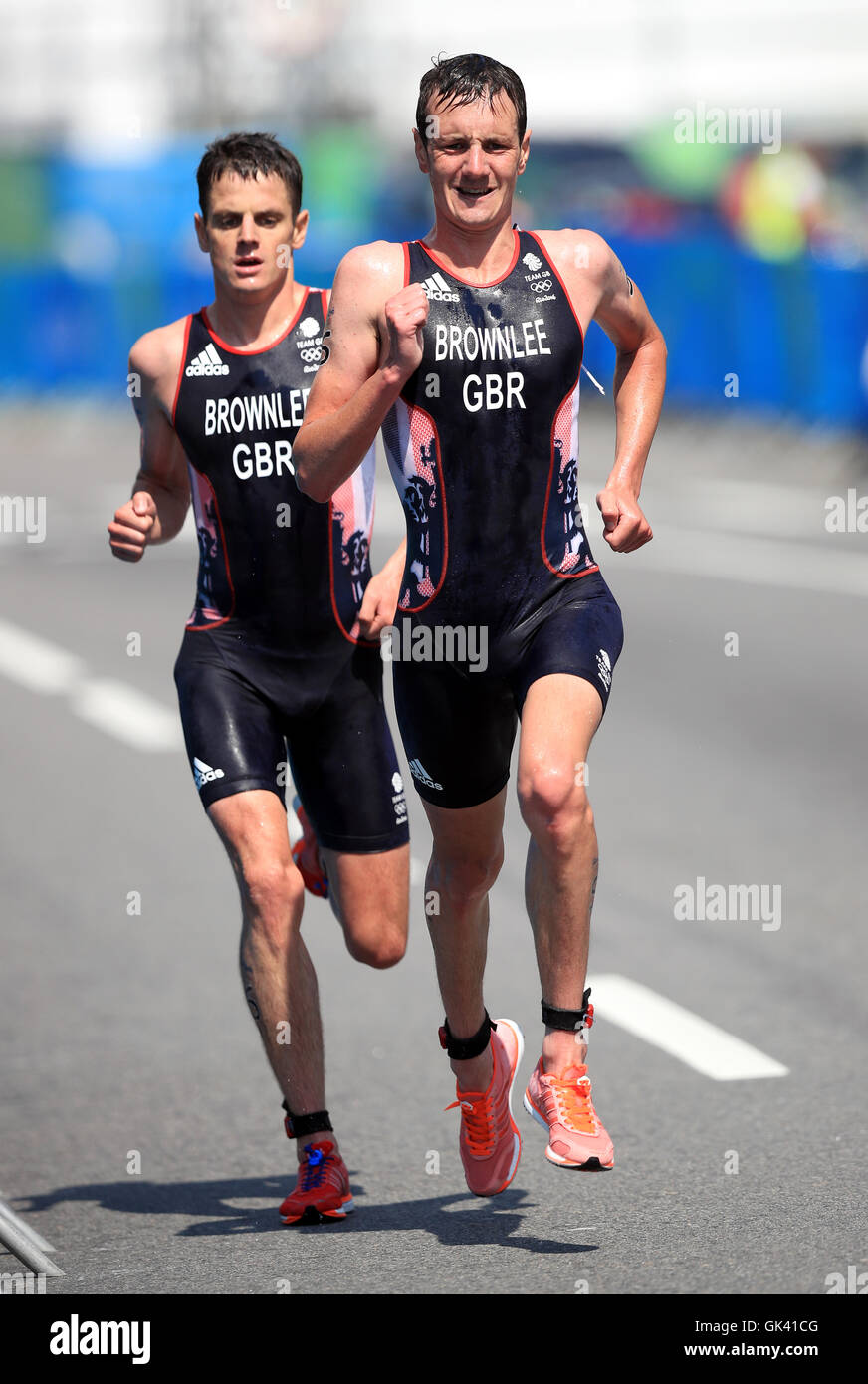 Great Britain's Alistair Brownlee leads from brother Jonny during the  running section of the Men's Triathlon at Fort Copacabana on the thirteenth  day of the Rio Olympic Games, Brazil Stock Photo -
