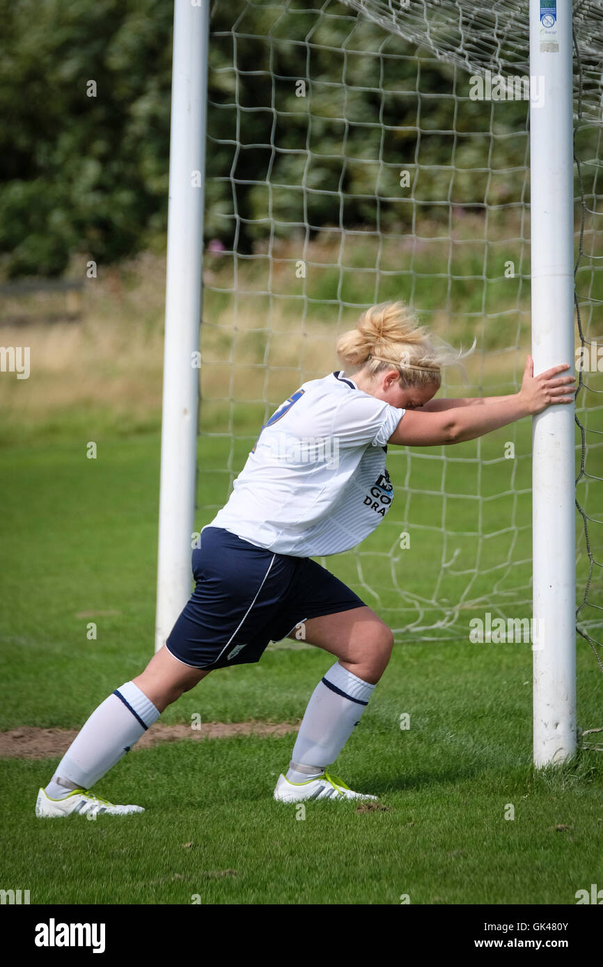 stretching out prior to football match Stock Photo