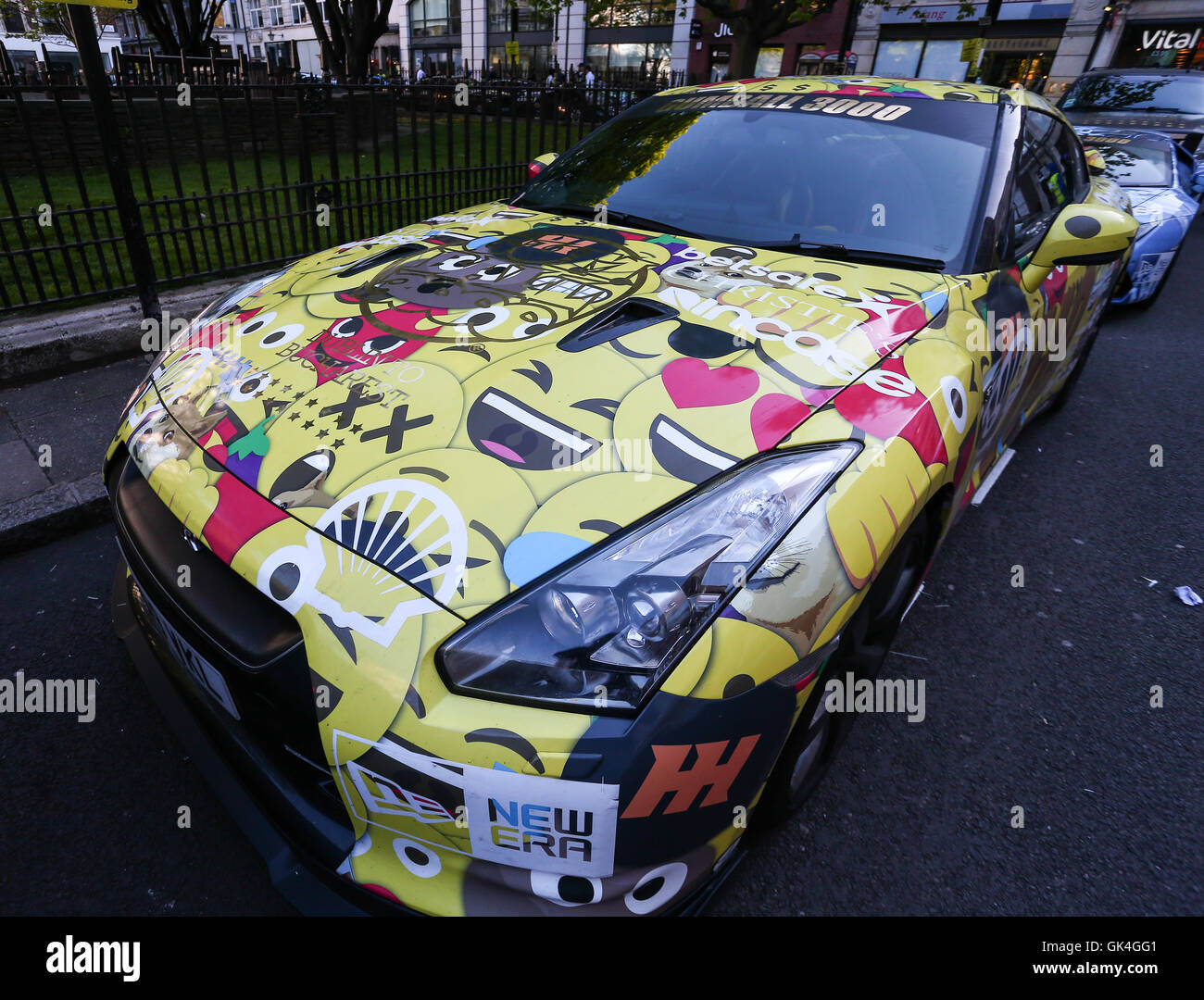 An emoji wrapped Nissan GT R competes in the 2016 Gumball 3000 in ...