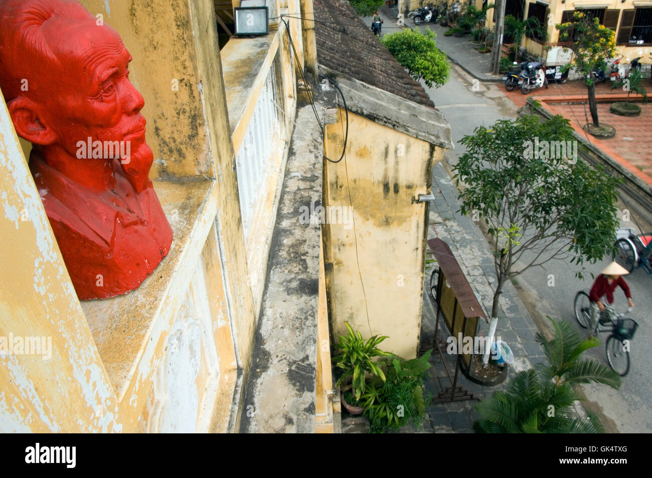 22 Mar 2007, Hoi An, Vietnam --- Sculpture Bust of Ho Chi Minh Overlooking Street --- Image by © Jeremy Horner Stock Photo