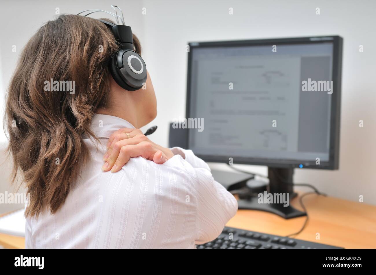 office pain monitor Stock Photo - Alamy