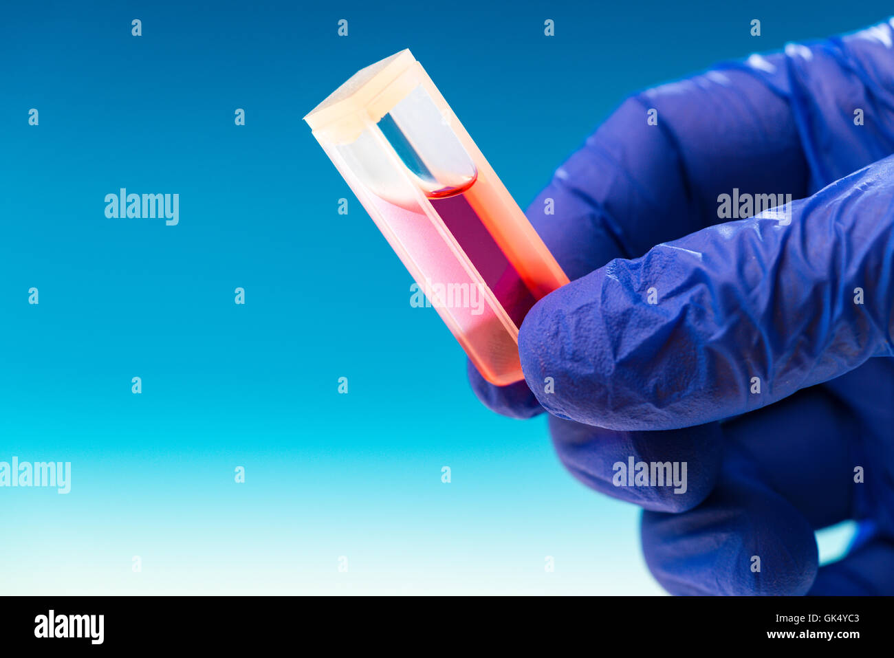 Quartz and Glass Cuvettes in hand small square tube designed to hold