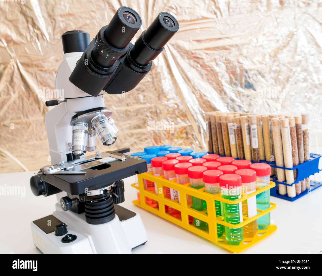 Science microscope on lab bench. Microbiology laboratory. Water