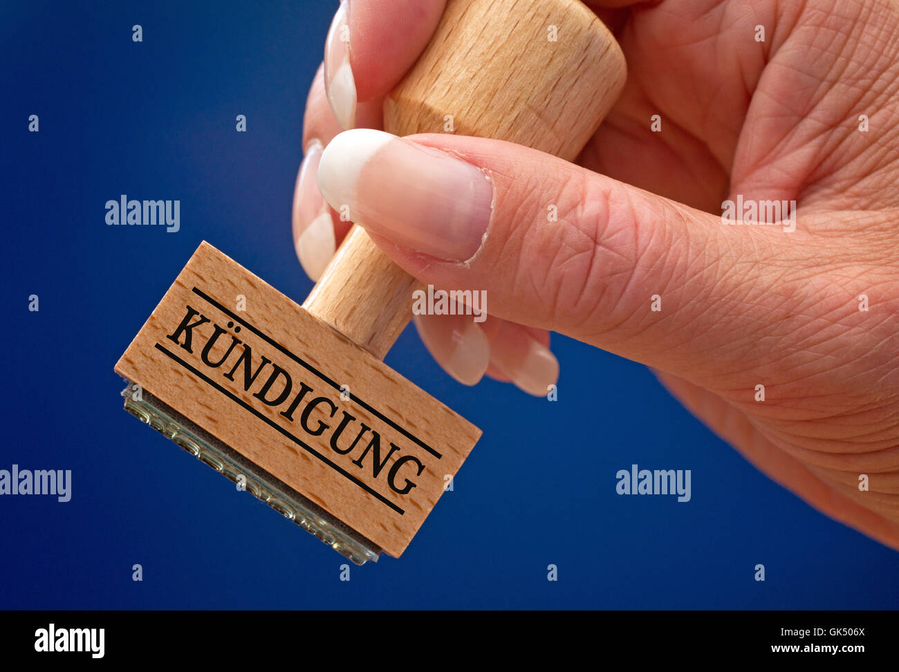 termination - stempel mit hand Stock Photo