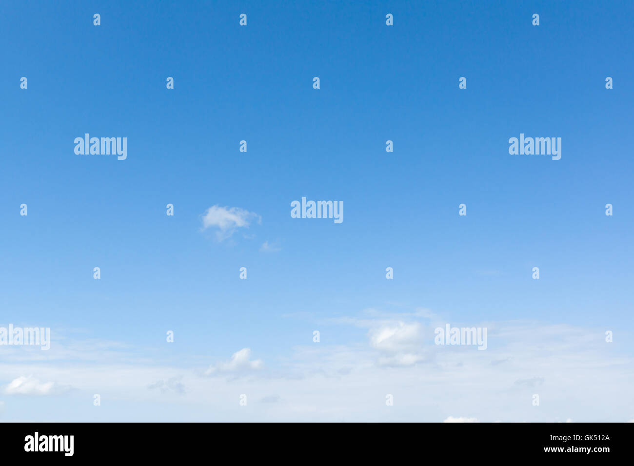 white clouds floating on a background of blue sky Stock Photo - Alamy