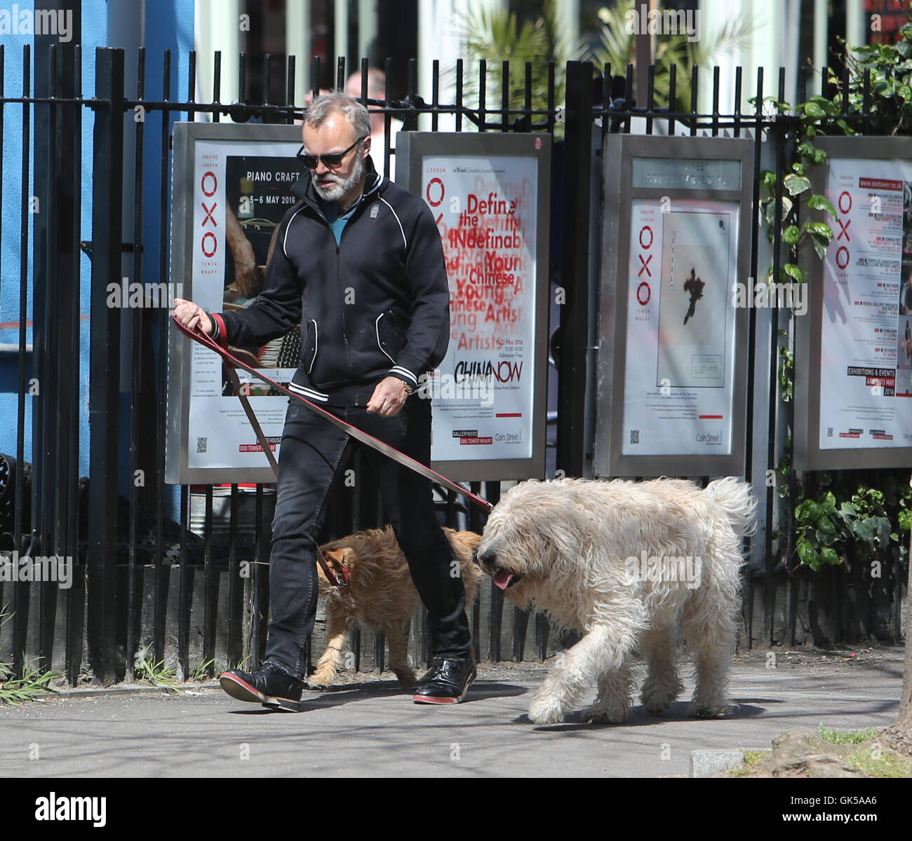 Graham Norton outside ITV Studios walking his dogs Featuring Graham