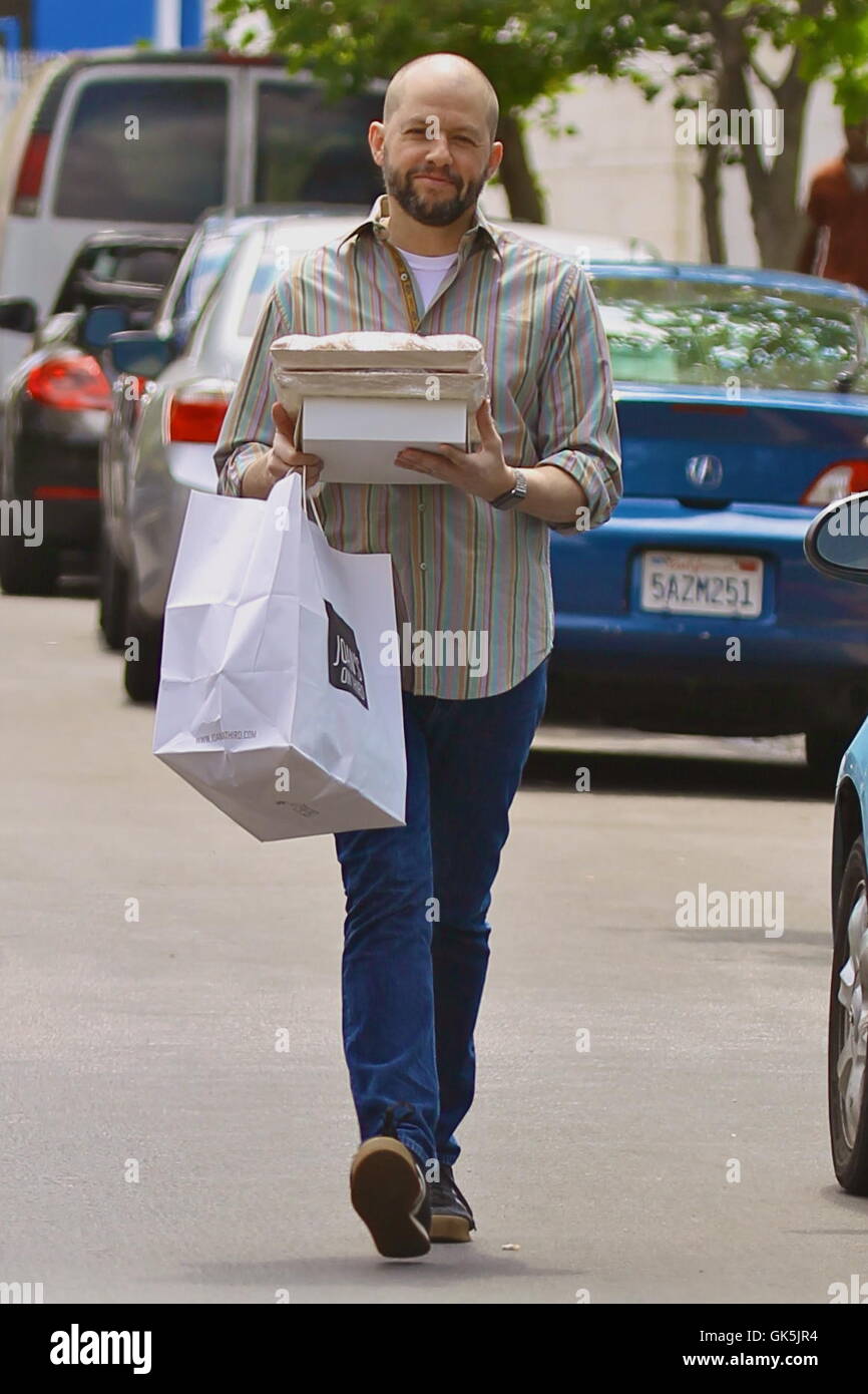 Jon Cryer is barely recognizable with a shaved head and beard on Mother's Day carrying baked goods from Joan's on Third  Featuring: Jon Cryer Where: Studio City, California, United States When: 08 May 2016 Stock Photo