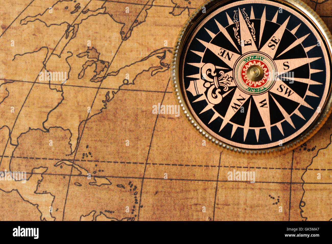 Old compass and map Stock Photo - Alamy